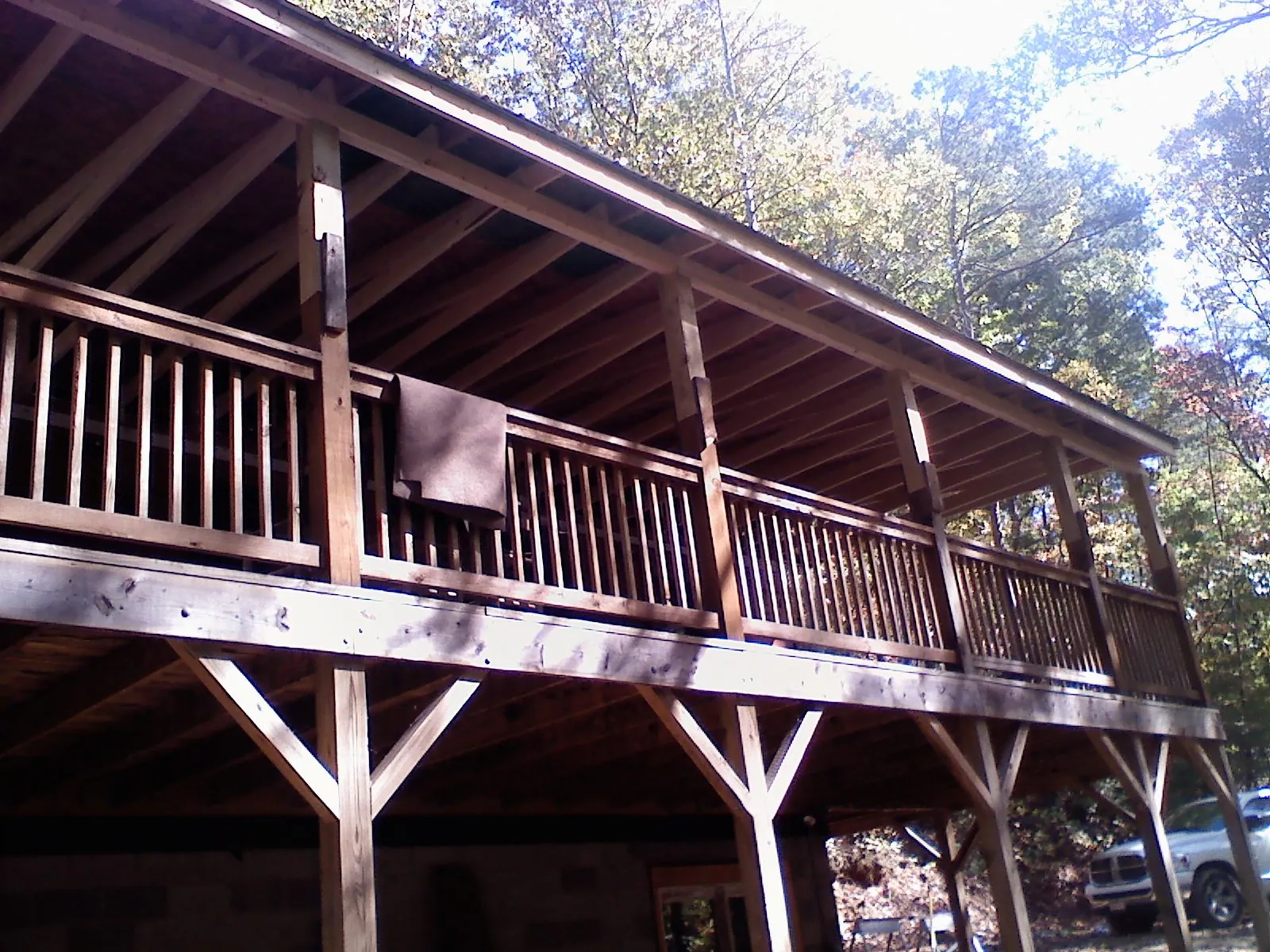 Timber framing under a new elevated porch and deck — Roof Leak Repair in Arlington Heights by Roofing Brothers